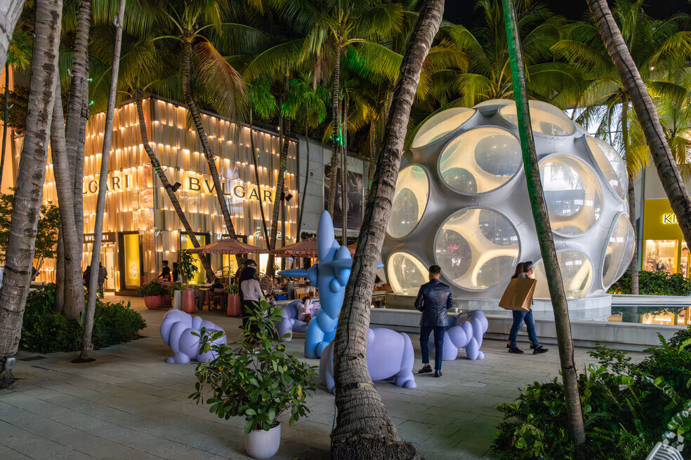 Miami Design District at night illuminated with artistic lighting and luxury storefronts